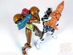 Figma Samus Aran and S.H. Figuarts Kamen Rider Fourze with weapons equipped
